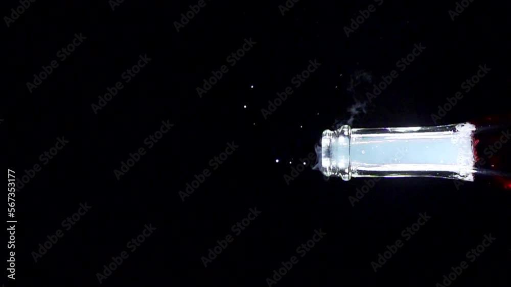 Super slow motion shot of champagne explosion, opening champagne bottle closeup. Filmed on high speed cinema camera, 4k1000fps Super slow motion shot of champagne explosion, opening champagne bottle closeup. Filmed on high speed cinema camera, 4k1000fps