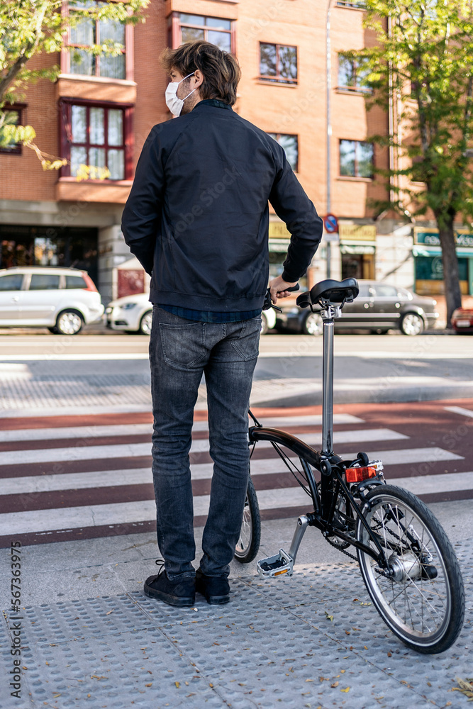 Man Using Bike in the Street