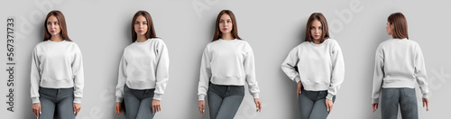 Mockup of a white crop sweatshirt on a beautiful girl in gray jeans, isolated on background, front, back view.