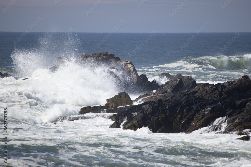 Ocean waves splashing on a rocky shore