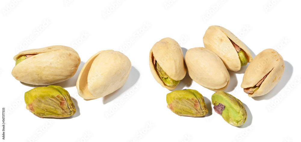 Fototapeta premium Salted open inshell pistachios isolated on a white background, tasty and healthy snack