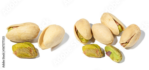Salted open inshell pistachios isolated on a white background, tasty and healthy snack