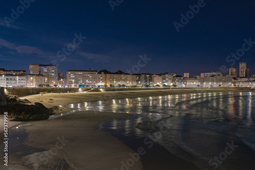 Empty beach without people in the city of La Coruna Spain at night.
