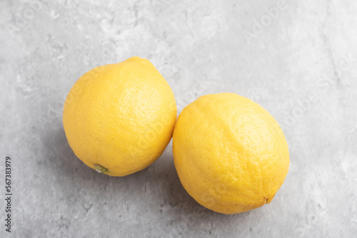yellow lemons on a gray background