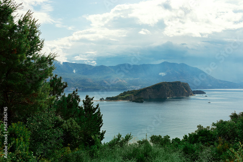 Scenic landscape of the sea island in Budva. Tourism in Montenegro.