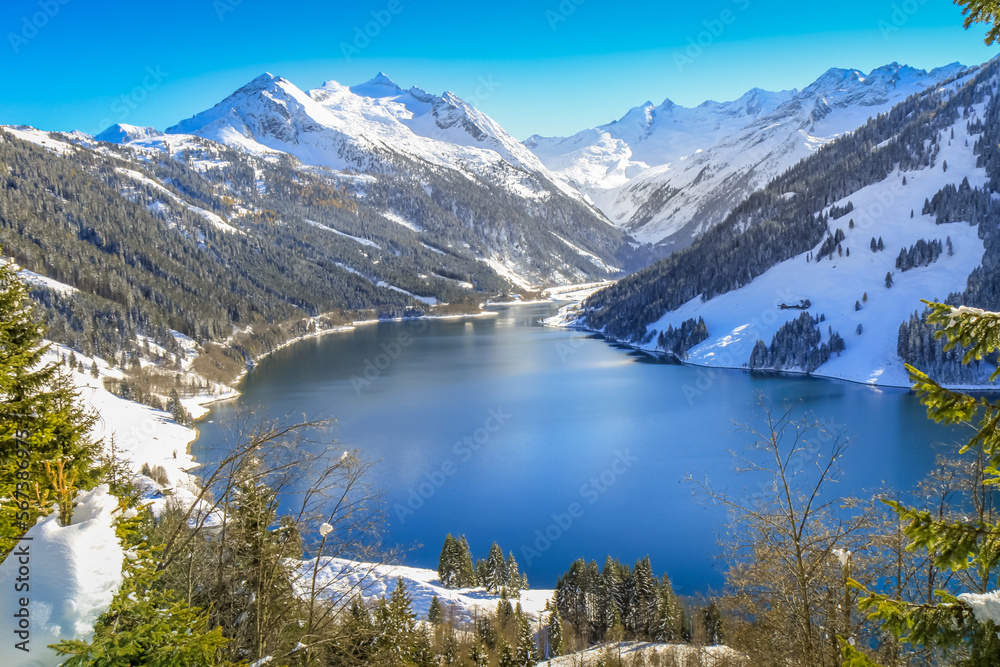 Alpine lake reservoir near Zillertal alps valley, Tyrol alps, Austria
