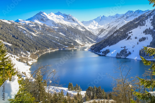 Alpine lake reservoir near Zillertal alps valley, Tyrol alps, Austria