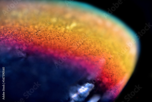 Stone surface in rainbow spectrum. Ultra Macro