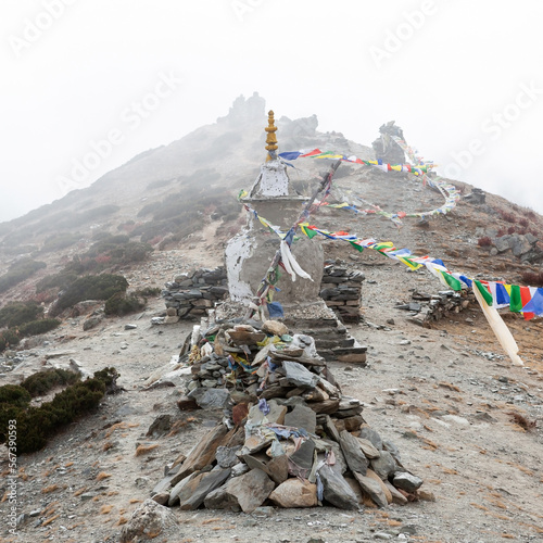 Buddhist gompa with prayer flags in the Himalayas, Nepal, during the Everest trek.