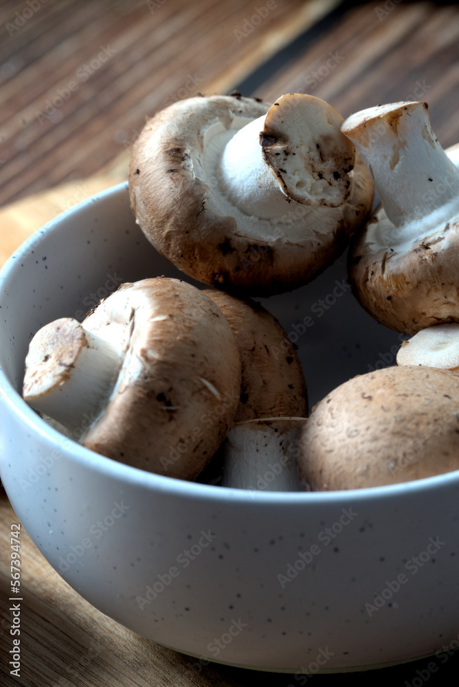 White bowl with portobello mushrooms White bowl with portobello mushrooms