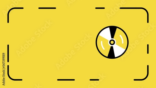 4k video of CD on yellow background.