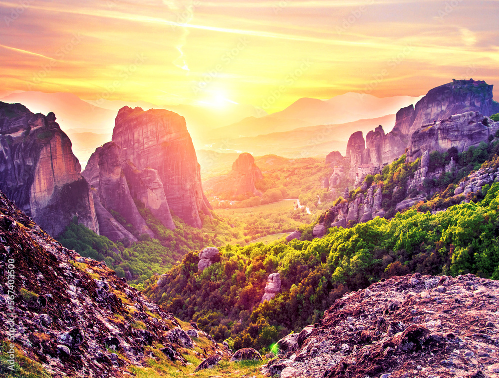 magnificent magical landscape in the famous valley of the Meteora rocks in Greece at sunset. Great amazing world. Attractions.