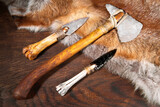 Stone Age Tools on wooden Background