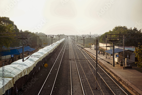 Photography in india a loader train is standing in railway station at left side and a view o