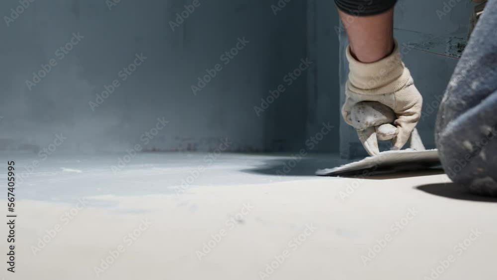 spread the insulation on the concrete floor using a trowel spread the insulation on the concrete floor using a trowel
