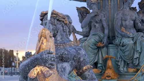 Close up on a naiad of a water fountain on the Place de la Concorde square in Paris, France