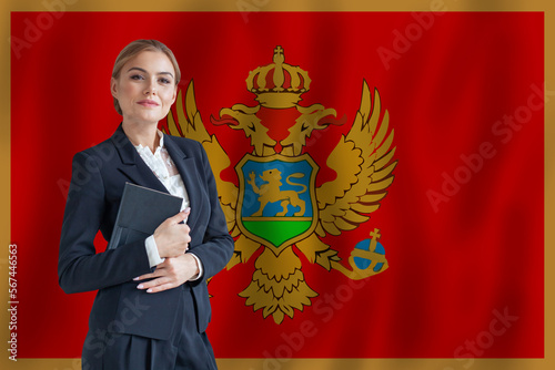 Montenegro businesswoman on the flag of Montenegro digital  nomad, business, startup concept photo