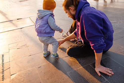 Wallpaper Mural Dad and child draw with chalk on the pavement. Torontodigital.ca
