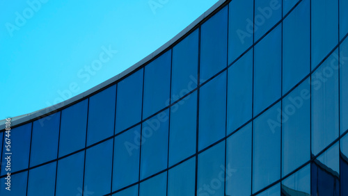 Corporate building in city  modern glass business center. view of the wall of glass  perspective to the sky