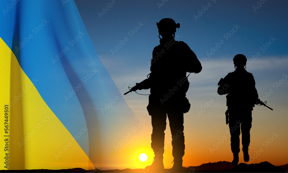 Obraz premium Flag of Ukraine with silhouettes of soldiers against the sunset. Armed forces of Ukraine concept. EPS10 vector