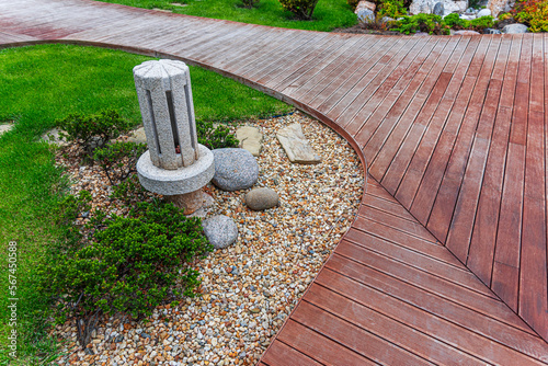 Decking path in the garden. Garden element. photo