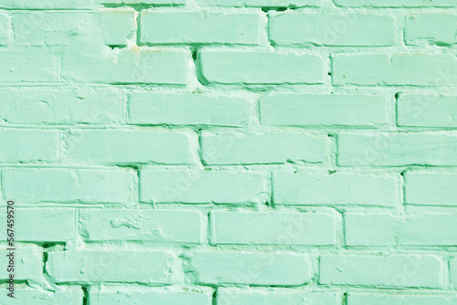 Brick wall with unusual green bricks