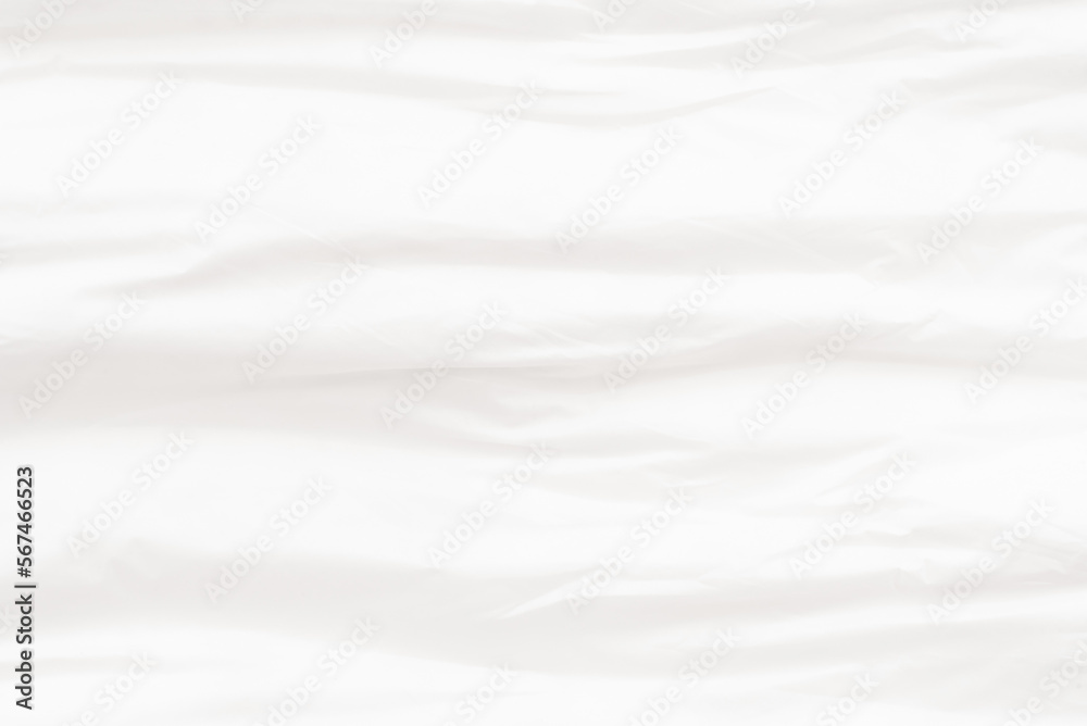 Texture of a white napkin. Water absorbent material. White wrinkled fabric