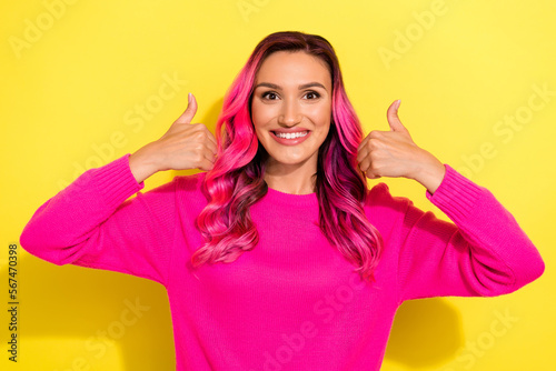 Photo of positive millennial lady show two like symbols demonstrate goof quality beauty salon isolated on vivid color background