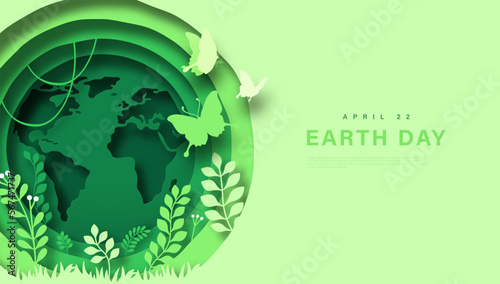 Earth day april 22 paper cut web template illustration. Green papercut planet with nature environment inside. Modern 3d cutout design concept of world map, plant leaf and butterfly. photo