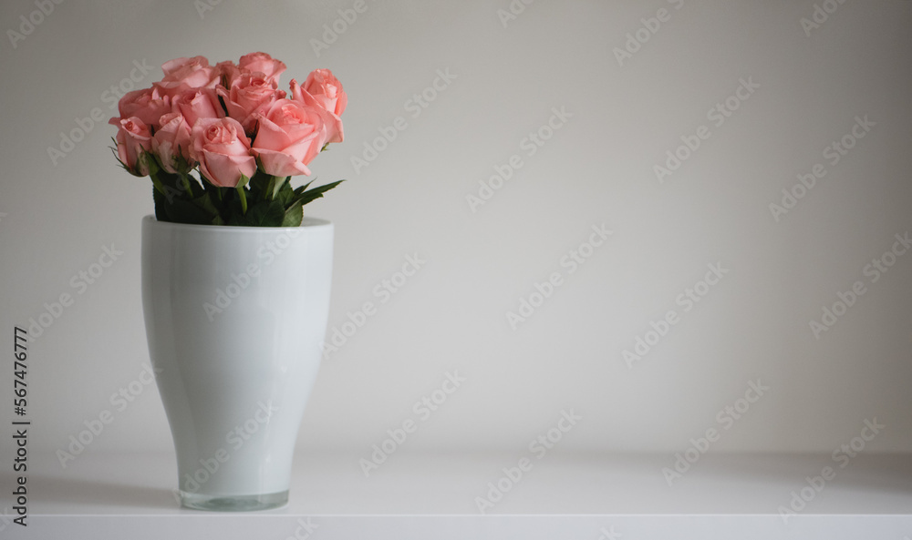 pink roses in a white vase, decoration