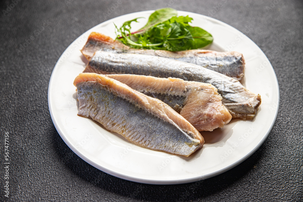 fillet herring boneless fish seafood meal food snack on the table copy space food background rustic top view fillet herring boneless fish seafood meal food snack on the table copy space food background rustic top view
