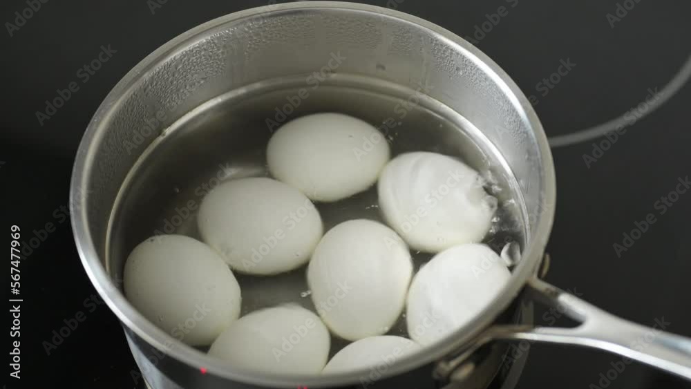 Chicken eggs in boiling water. egg cooking Chicken eggs in boiling water. egg cooking