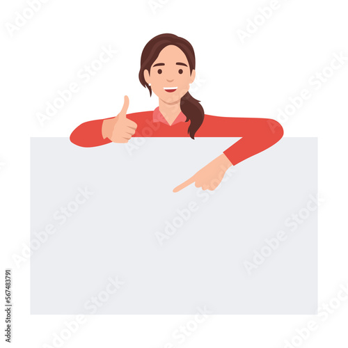 Young woman is standing behind the white blank banner and pointing down at a copy space with one thumb up. Flat vector illustration isolated on white background