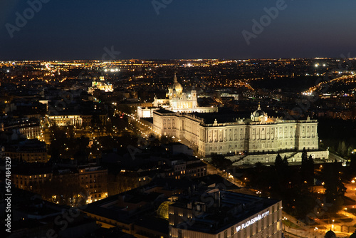 Madrid, Spain. April 6, 2022: Panoramic landscape of the royal palace with blue sky and city view. © camaralucida1