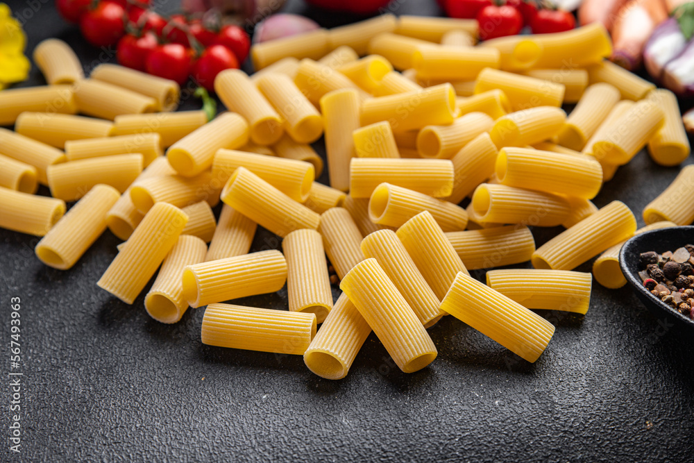 rigatoni raw pasta meal other ingredients food snack on the table copy space food background rigatoni raw pasta meal other ingredients food snack on the table copy space food background