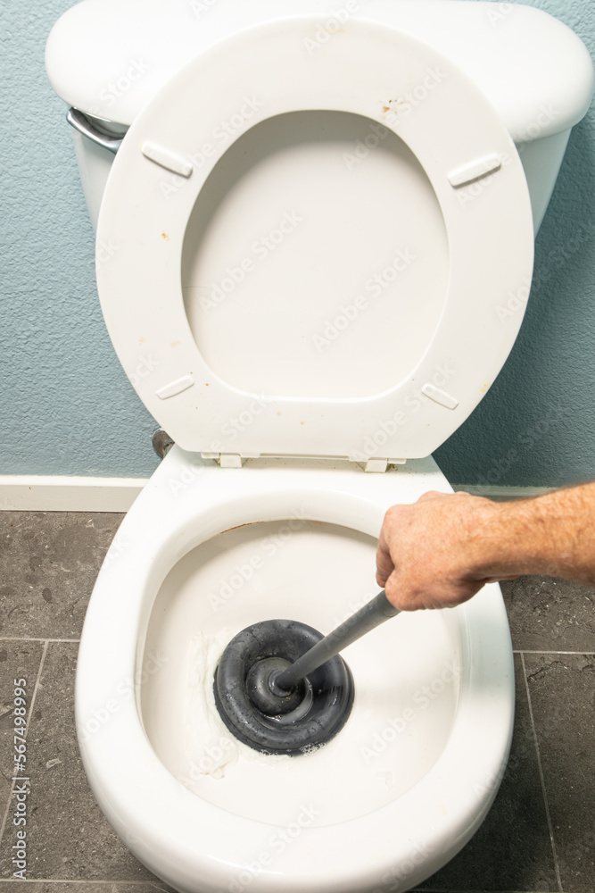 unclogging clogged toilet with plunger unclogging clogged toilet with plunger