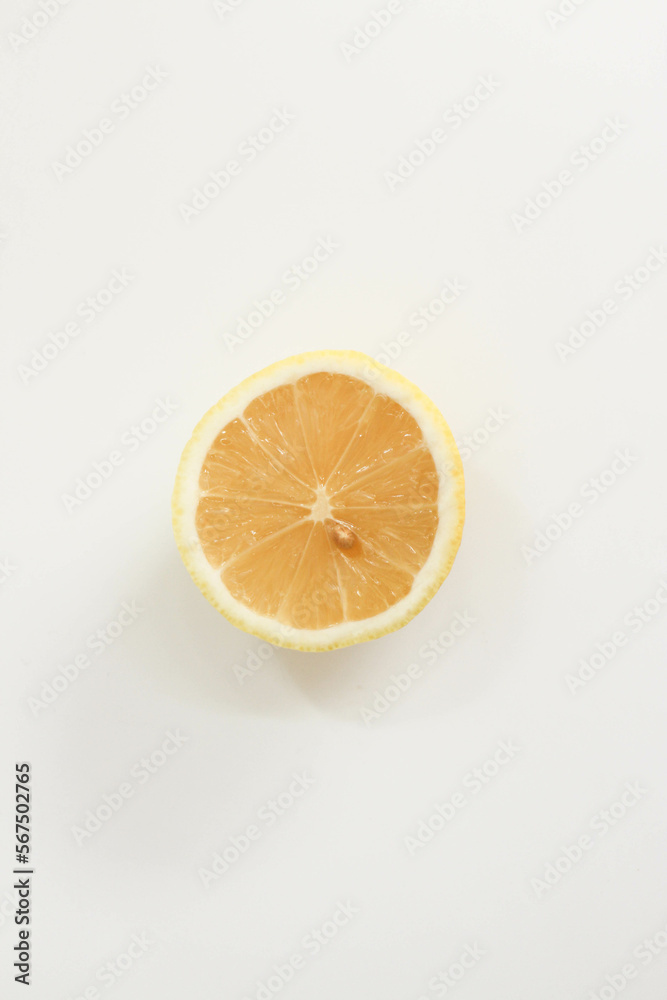 A Section of Yellow Lemon on white background A Section of Yellow Lemon on white background