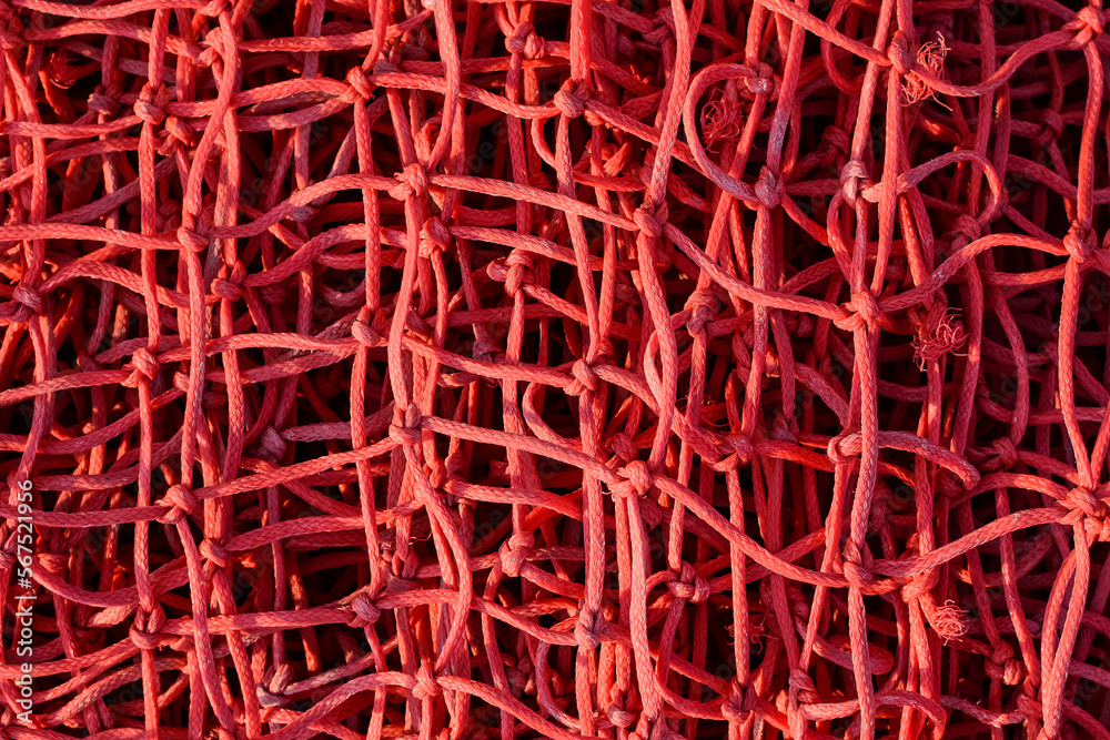 close-up of a red rope net. rope weave texture