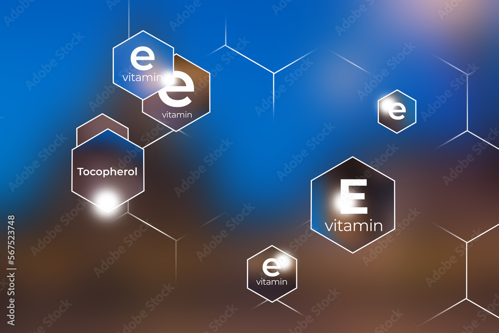 Immunity protection concept, vitamin E. Hexagons with Vitamin E name, blurry blue background. Immunity protection concept, vitamin E. Hexagons with Vitamin E name, blurry blue background.
