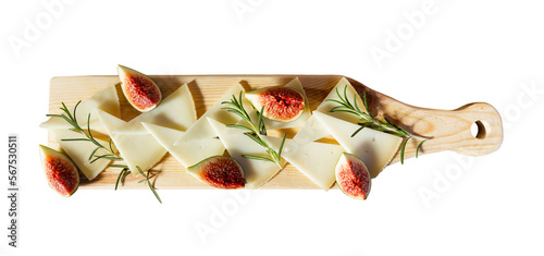 Serving board with slices of hard goat cheese garnished with sweet ripe figs and fragrant rosemary offered for degustation at goat farm. Isolated over white background
