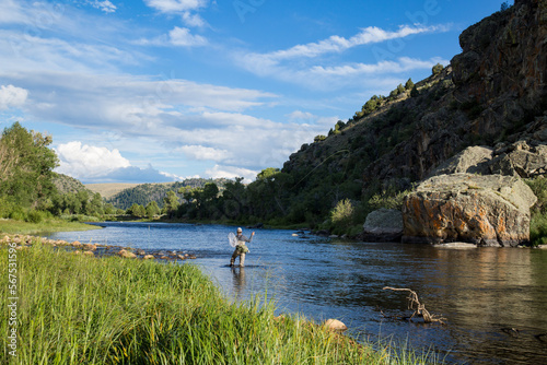 Fly Fishing on River photo