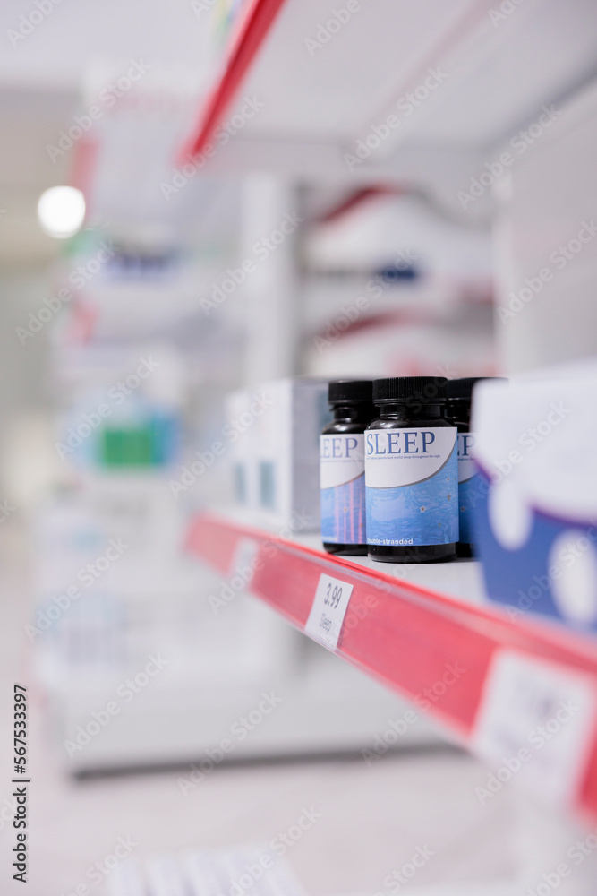 Pharmacy shelves filled with medicaments and pharmaceutical products to sell prescription medicine or treatment to customers. Empty drugstore with medication, supplements and vitamins, pills bottles.