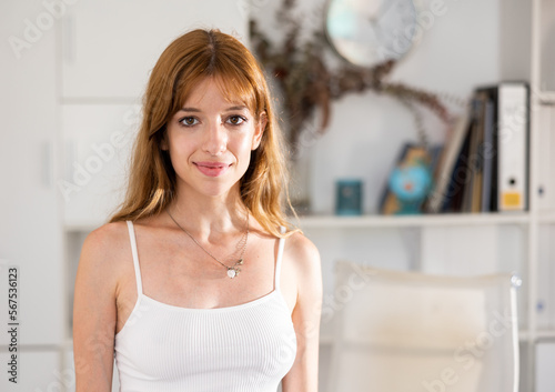 Portrait of smiling girl standing in the office