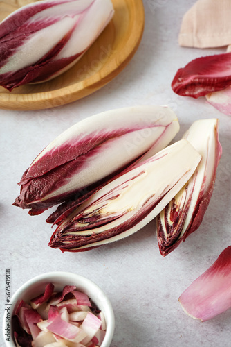 Bunches of fresh red endive on light background