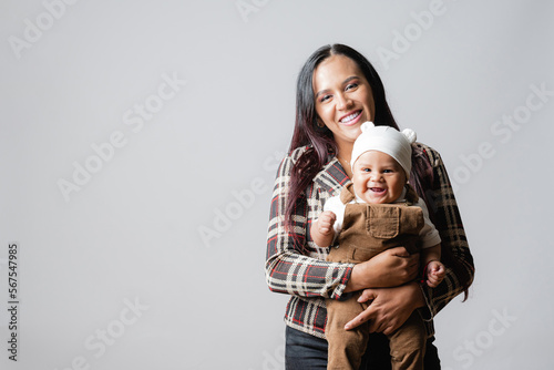  Latin American mom with her baby. Mother's Love. Baby smiling. Single mother and her son. Mother and baby very happy. Young mother holding her baby.