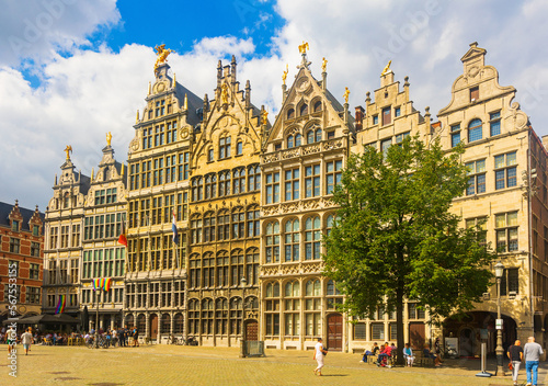 Grote markt of Antwerp, Belgium. Typical belgian buildings decorated with state and lgbt flags.