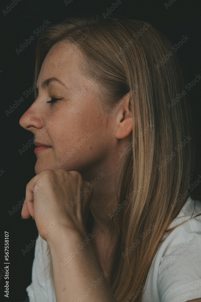 close-up portrait of a beautiful young blonde woman wich closed eyes close-up portrait of a beautiful young blonde woman wich closed eyes