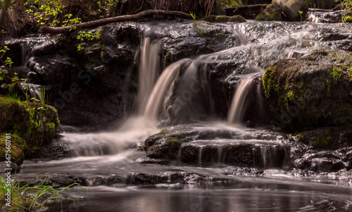 Fototapeta Naklejka Na Ścianę i Meble -  Waterfall in the forest close-up