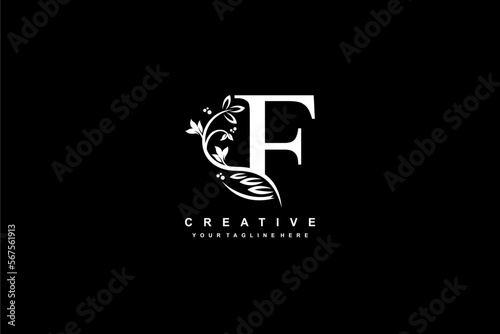 letter F logo design with flowers, leaves and feathers in a beautiful and elegant style. monogram F. typography F. initial F logo. suitable for, business, wedding, boutique, company, hotel, etc