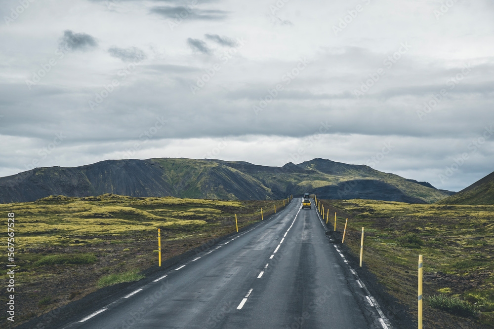 Empty road or highway in the natural environment of Iceland on a cloudy day